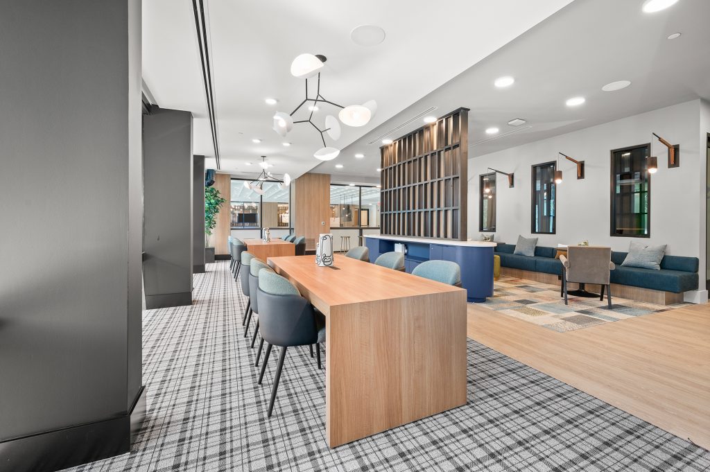 The Watt Co-working space, with a large table with 6 chairs.