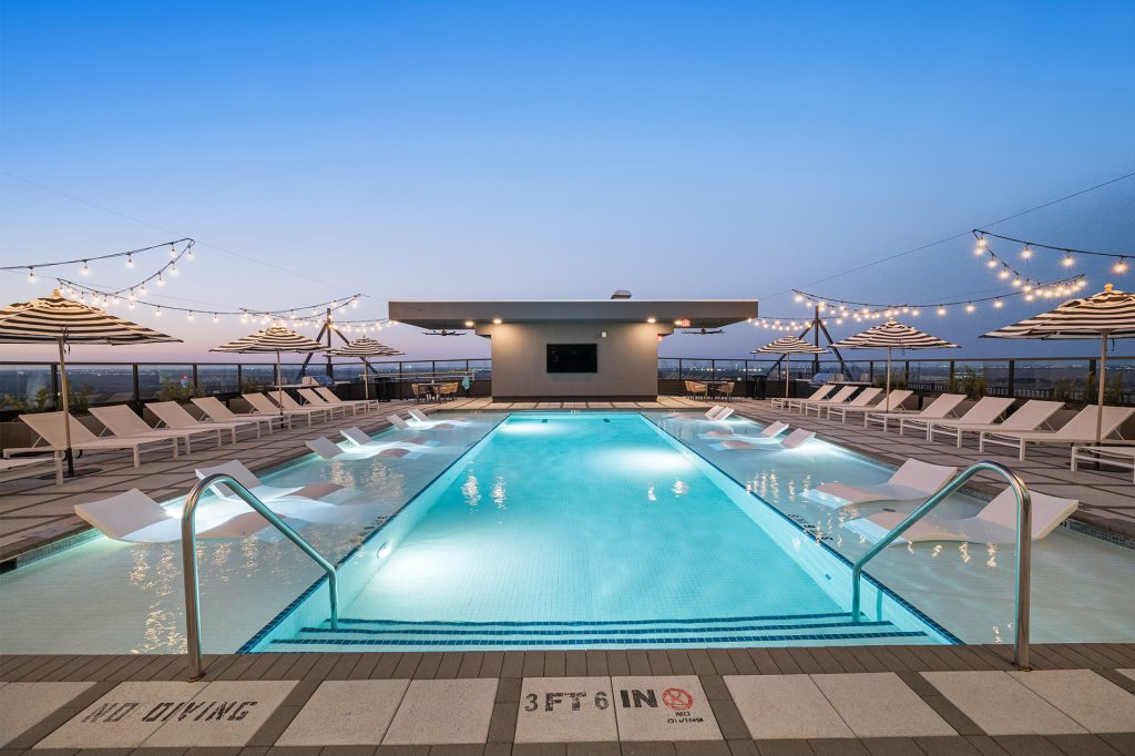 The Watt Apartments Rooftop Pool at Dusk