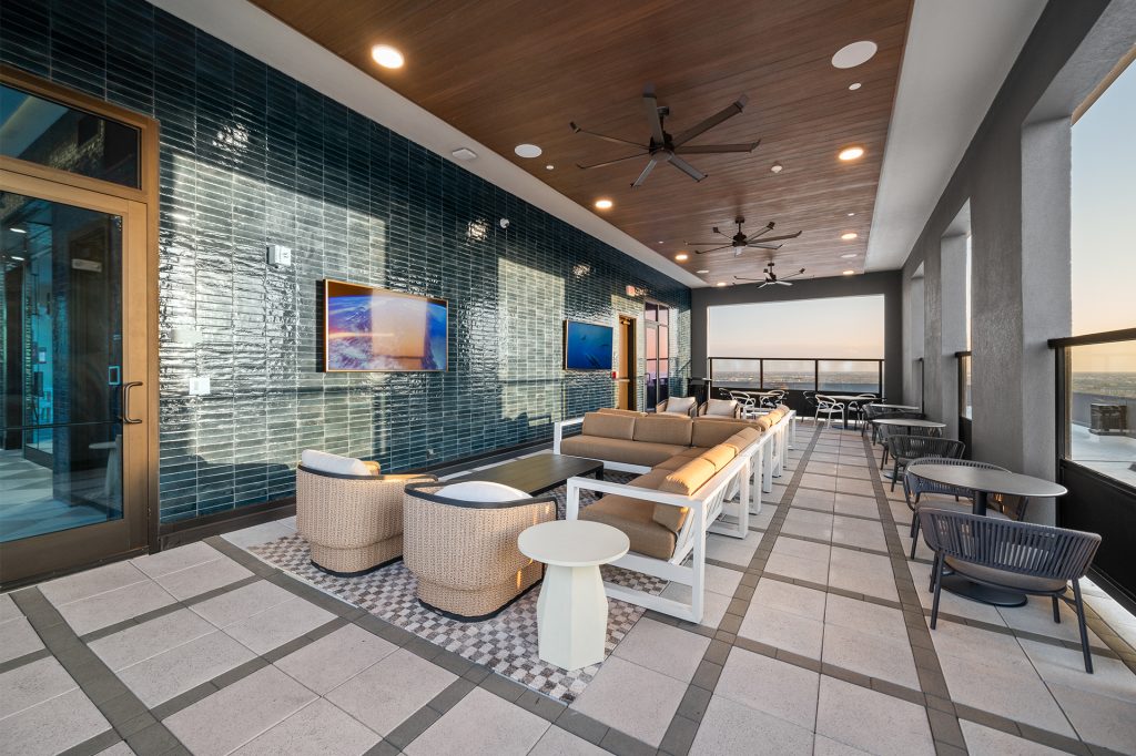 The Watt Rooftop Lounge Area with Sofas, Seating and TVs